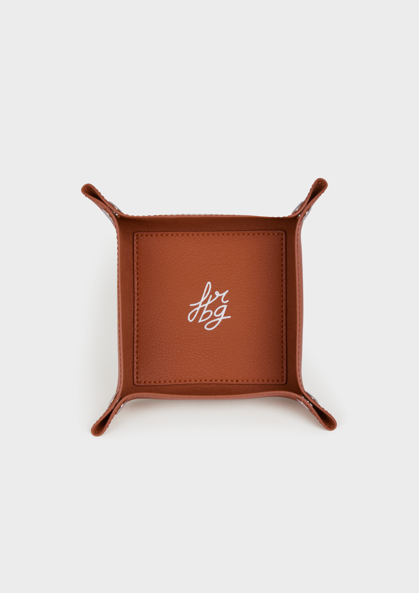 Vide-poche en cuir marron clair avec logo argenté "fbg"