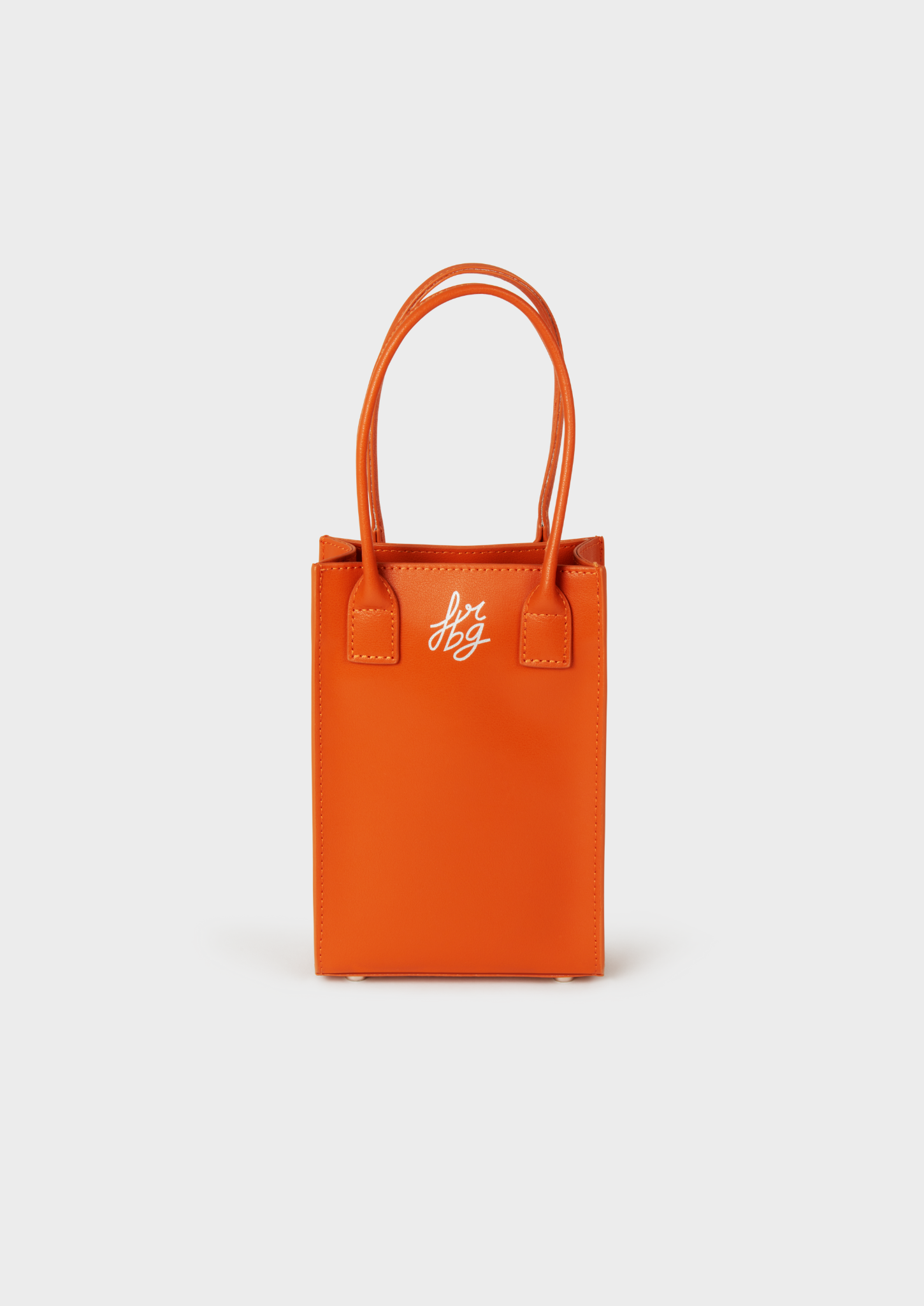 Petit sac à main orange en cuir, avec logo argenté "frbg"