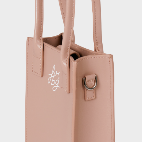 Petit sac rose clair avec poignées doubles et logo blanc "fbg"